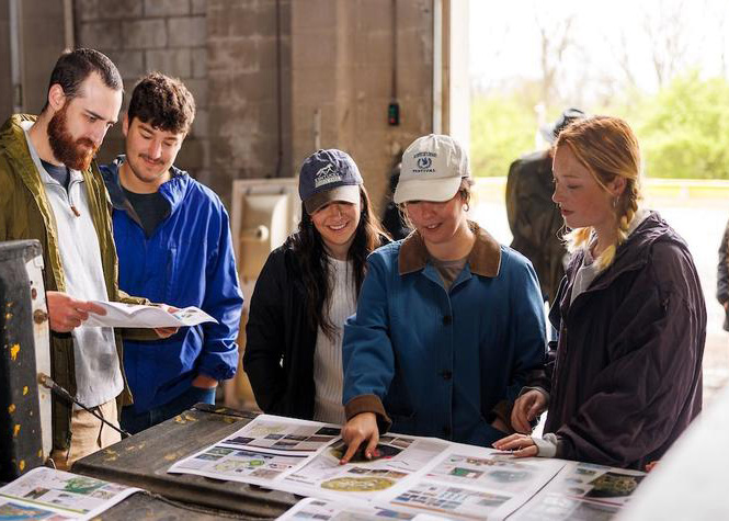 LA students review their master plan for a Paris, KY project